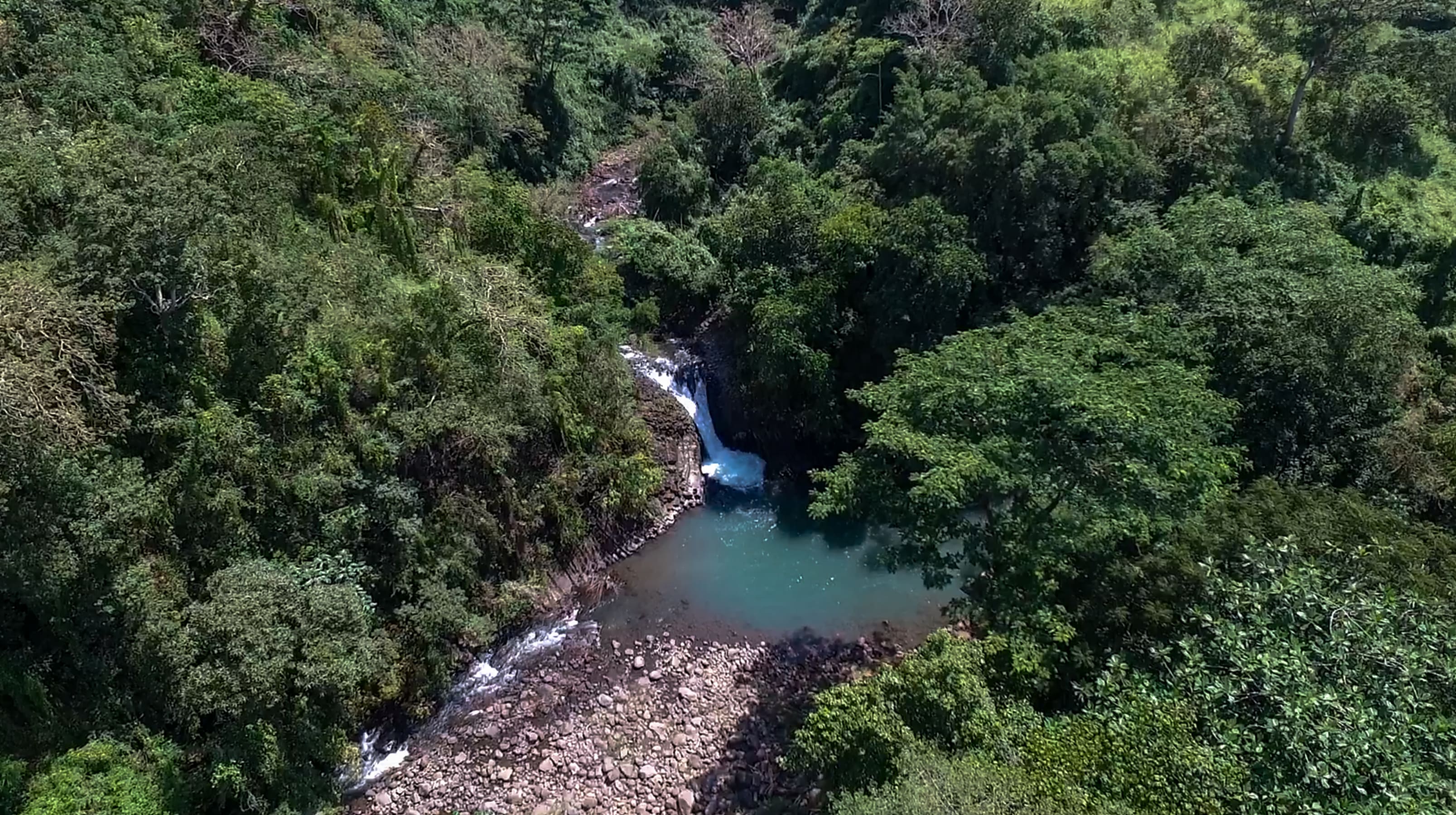 drone image of the dunsulan falls waterfall in bataan philippines